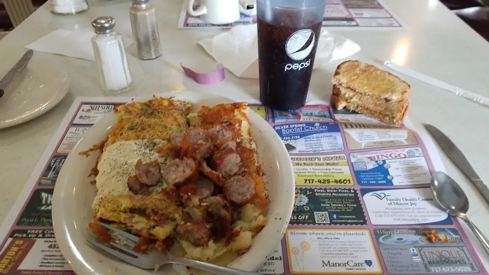 Western Omelet w Cheese and Side of Sausage Chopped on Top w Home Fries and Wheat Toast